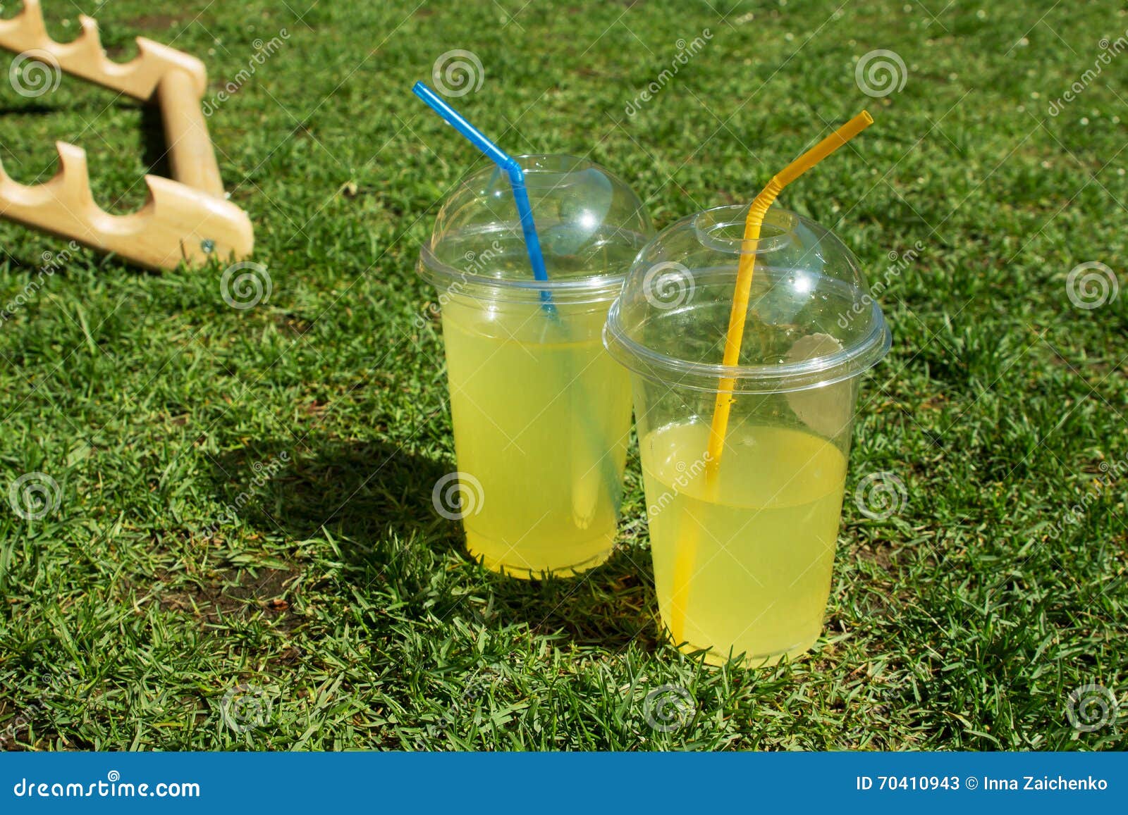 Lemonade in plastic cup stock image. Image of fresh, green 70410943