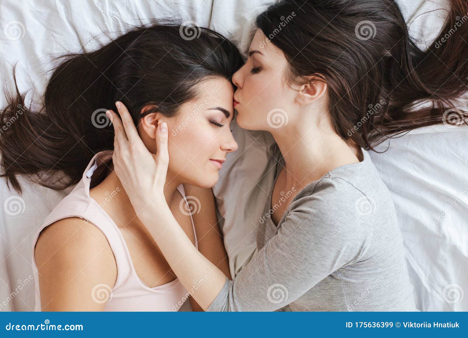 Lesbians Kissing On Bed