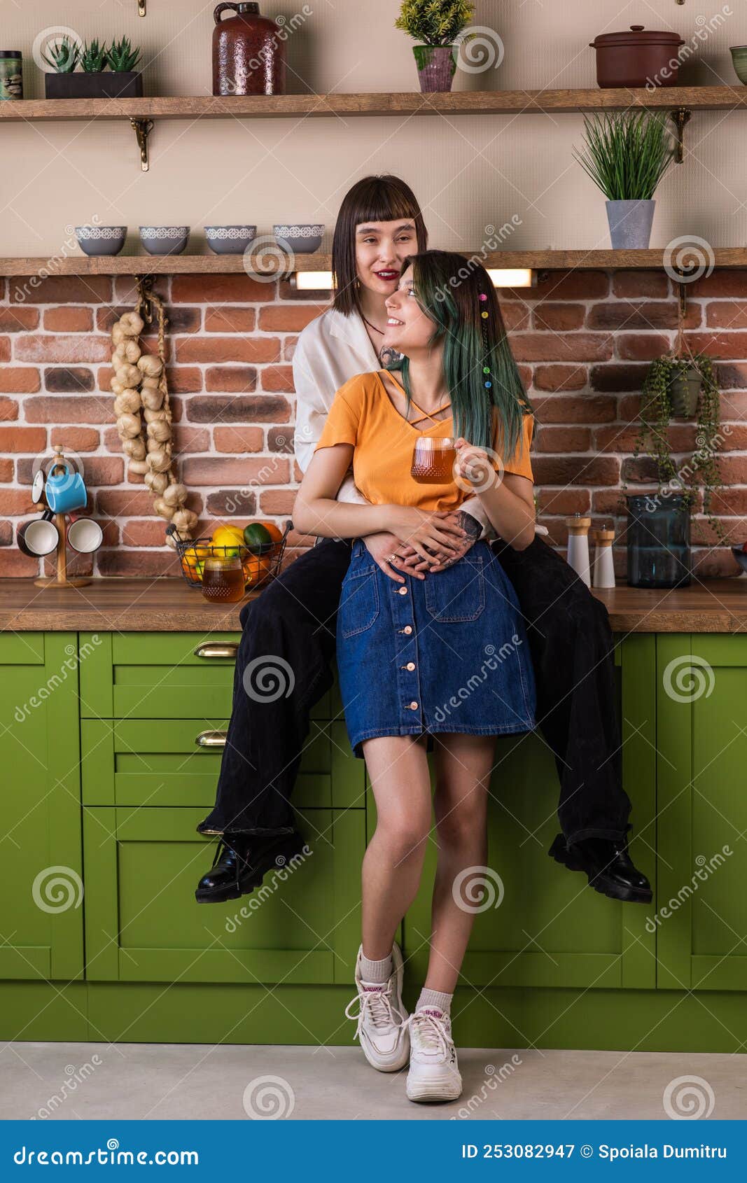 Lesbian Couple Discussing Happy In Front Of The Camera While Standing