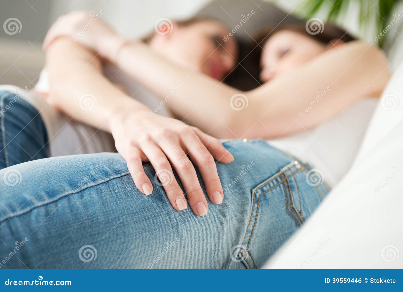 Lesbian Girls Kissing On The Sofa