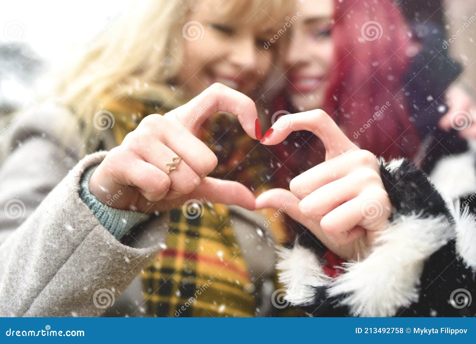 Lesbian Couple Making Heart with Hands, Open Relationship in Same-sex Love
