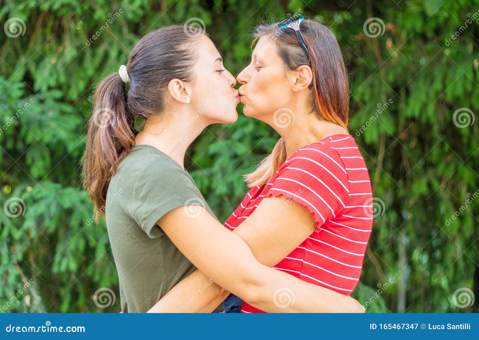 older lesbian kissing girl