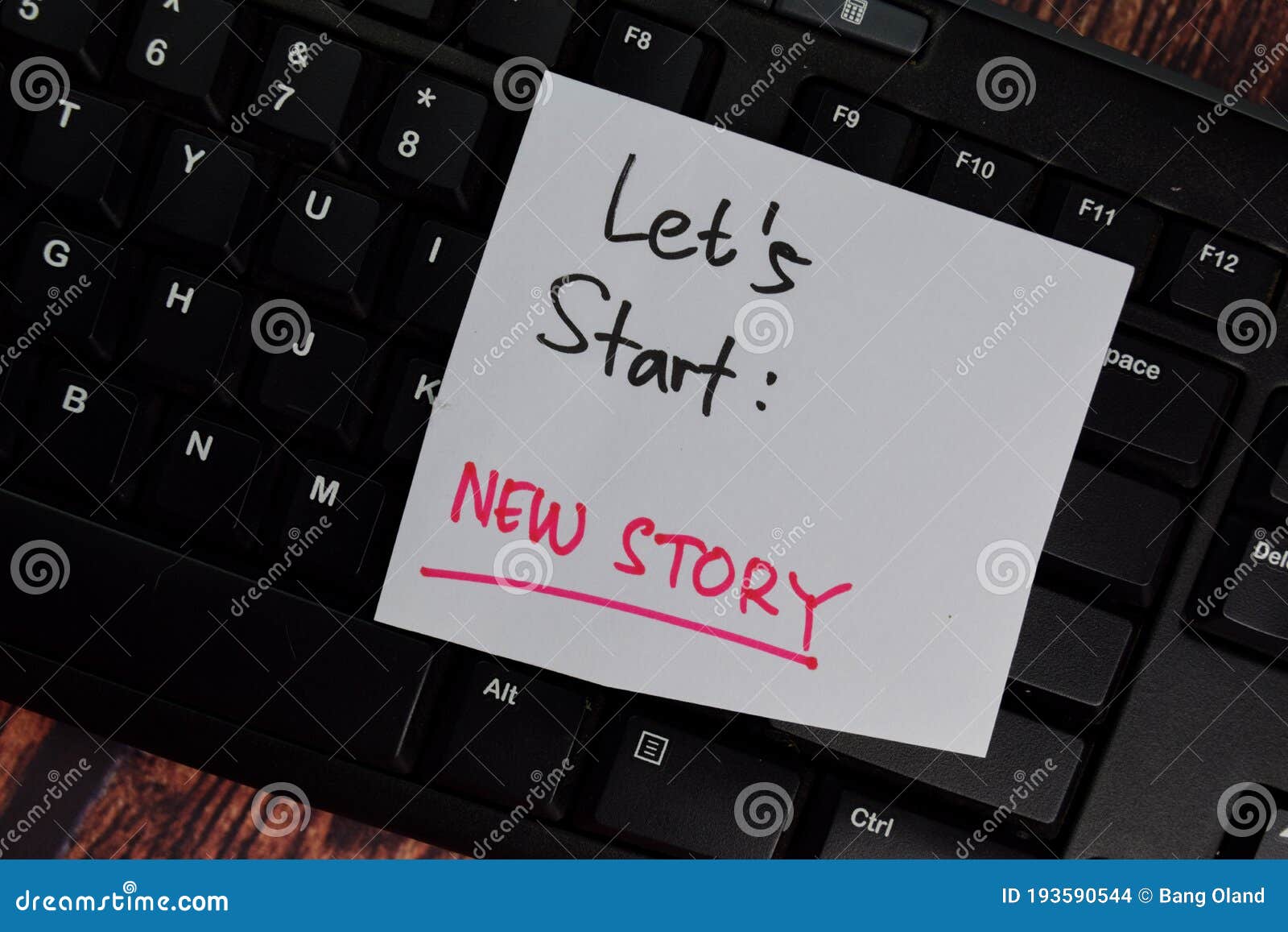 let`s start - new story text on sticky notes with office desk