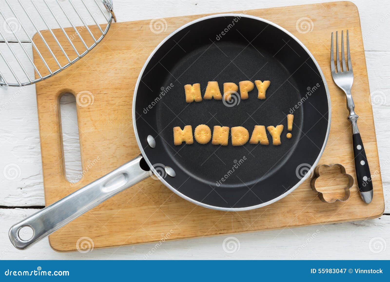 letter biscuits word happy monday and cooking equipments.