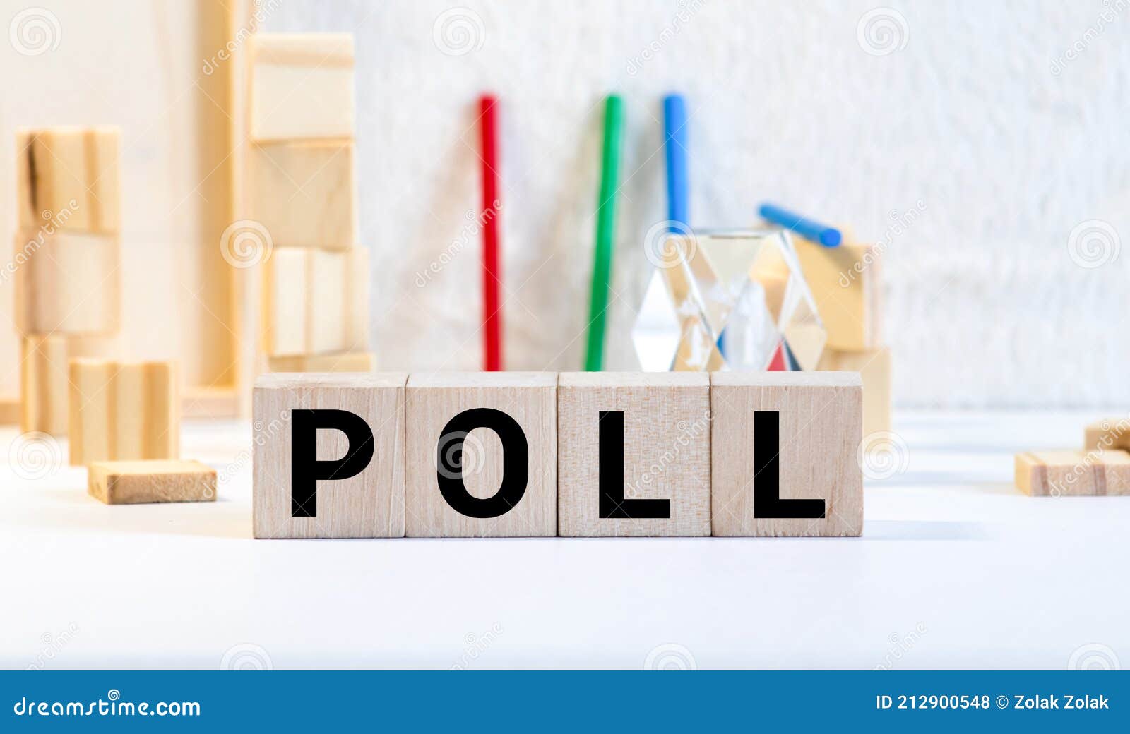 letter block in word poll on wood background