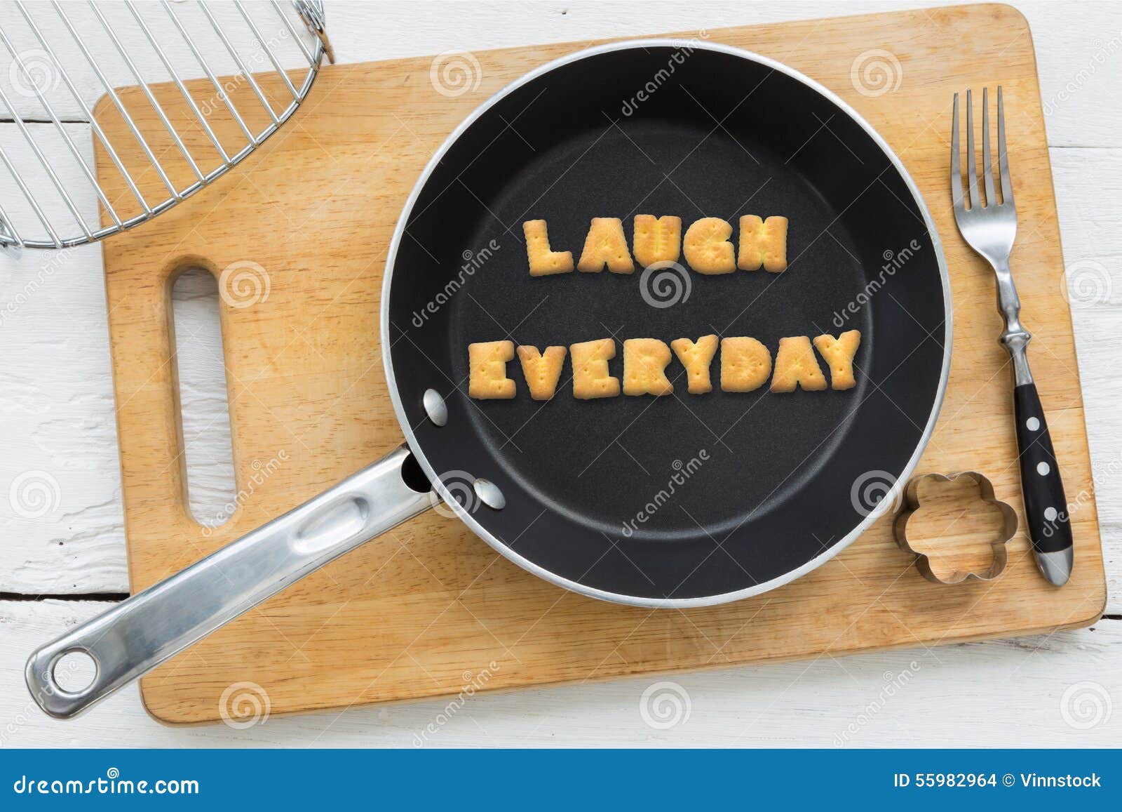 letter cookies word laugh everyday and kitchen utensils