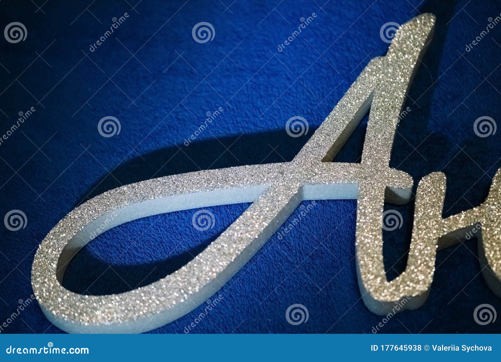 Letter and Word from Gray Extruded Polystyrene Foam Painted in Silver  Glitter. Decor Lies on a Dark Blue Background Stock Photo - Image of  confetti, card: 177645938