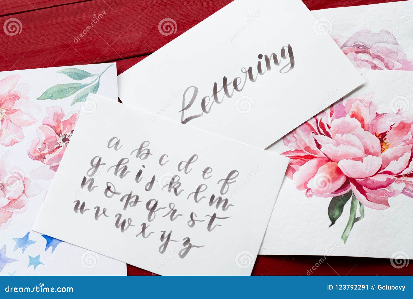 White Letter E on a Pink Background. Handwritten Script of the