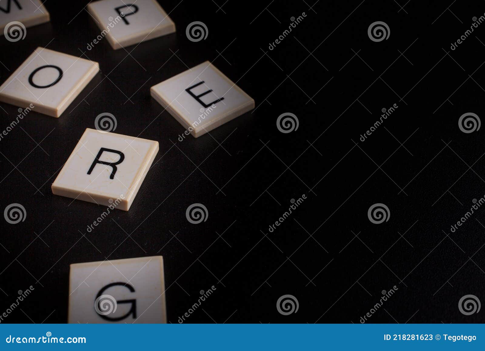 letters of the alphabet in random order on a black background