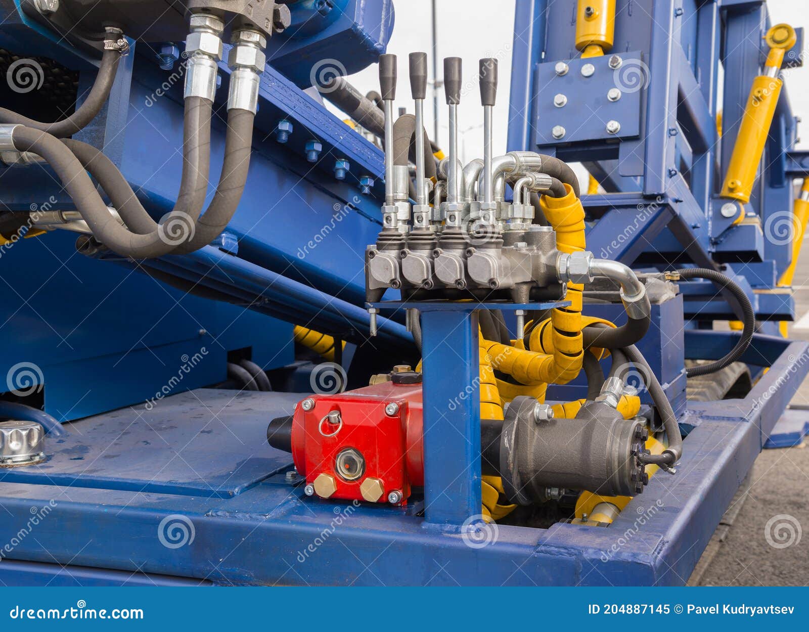 Levers and Pressure Control Unit of the Hydraulic Machine Closeup Stock