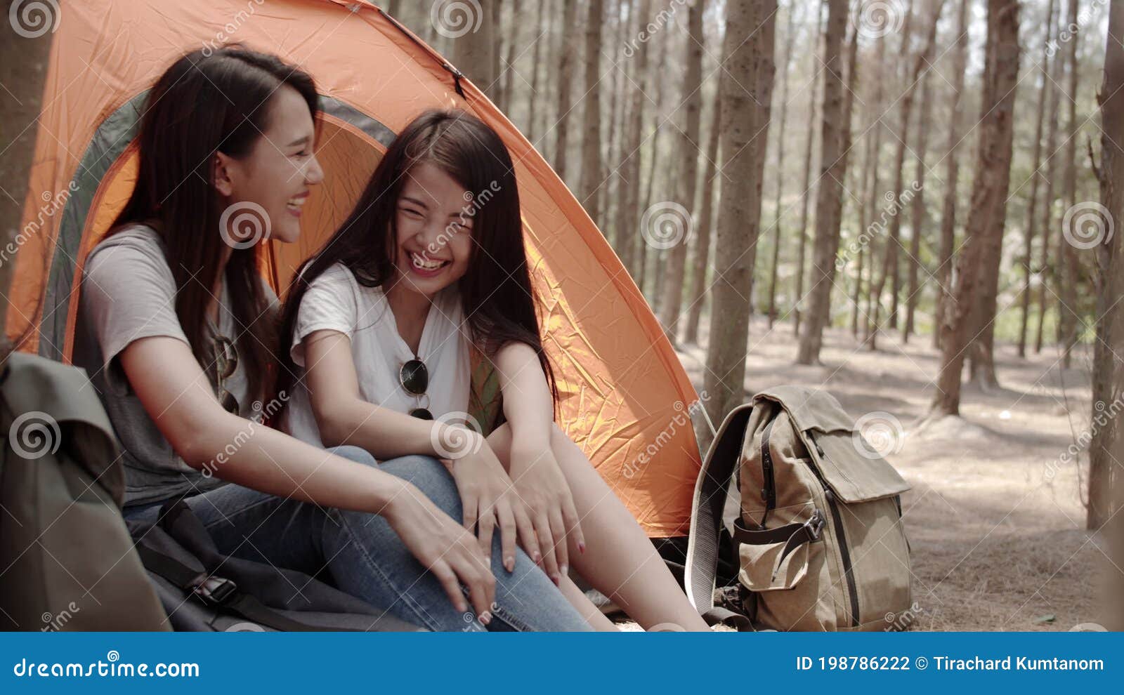 Lgbt Lesbian Women Couple Camping Or Picnic Together In Forest