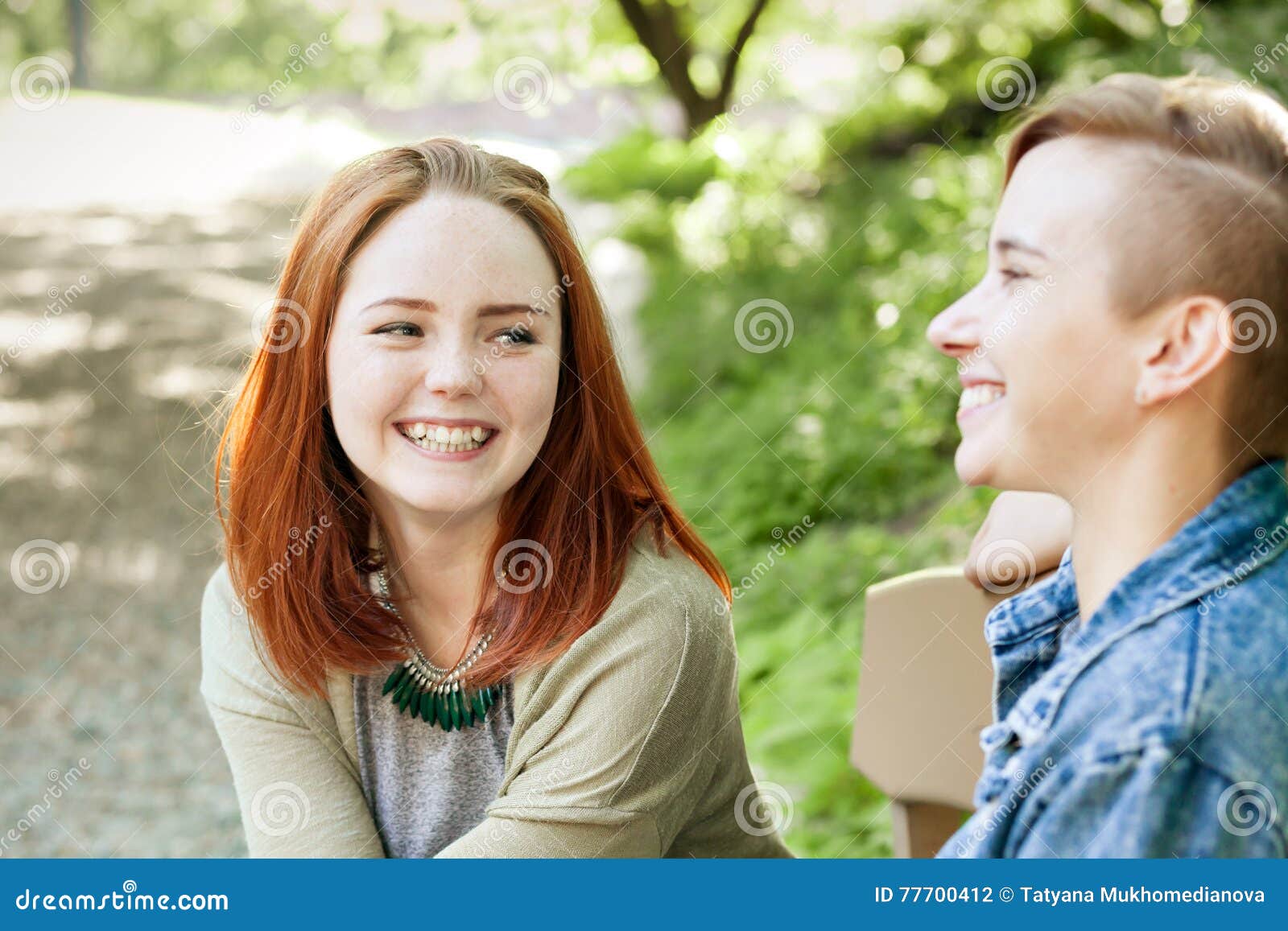 LGBT Women. Young Lesbian Couple Walking in the Park Together. Delicate Relationship