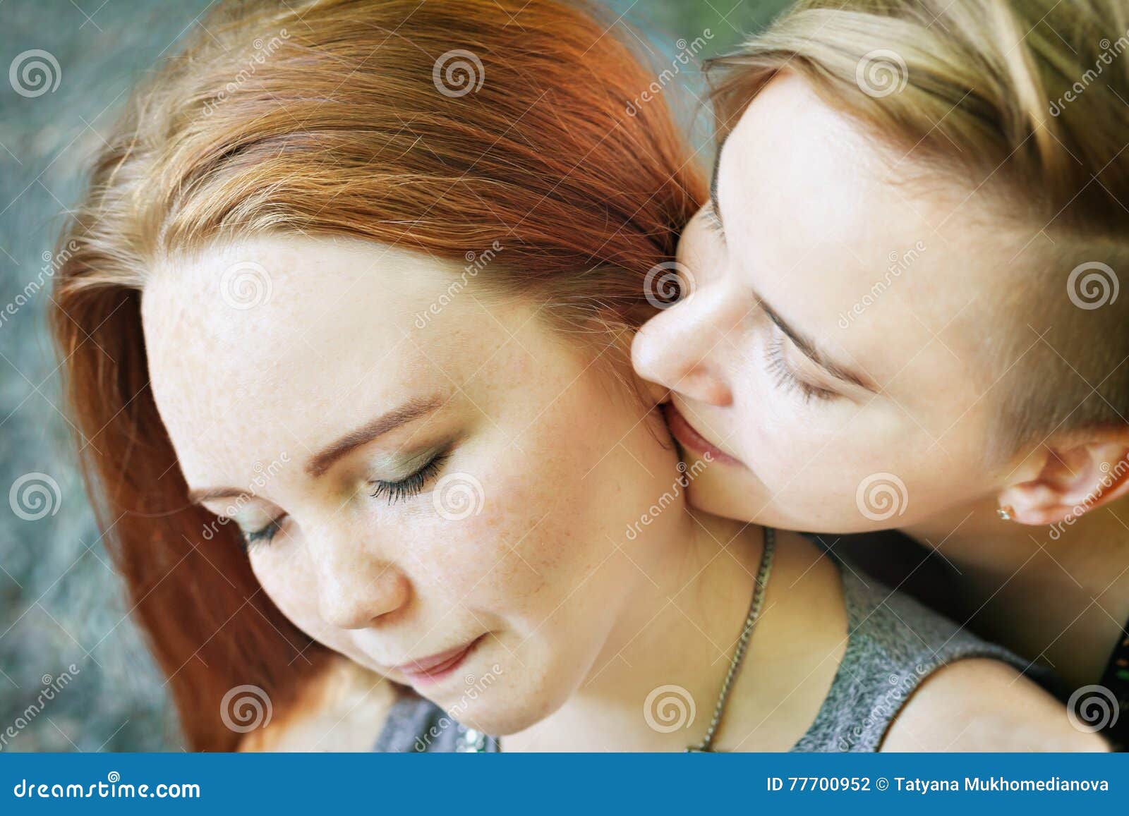 LGBT Women. Young Lesbian Couple Walking in the Park Together. Delicate Relationship