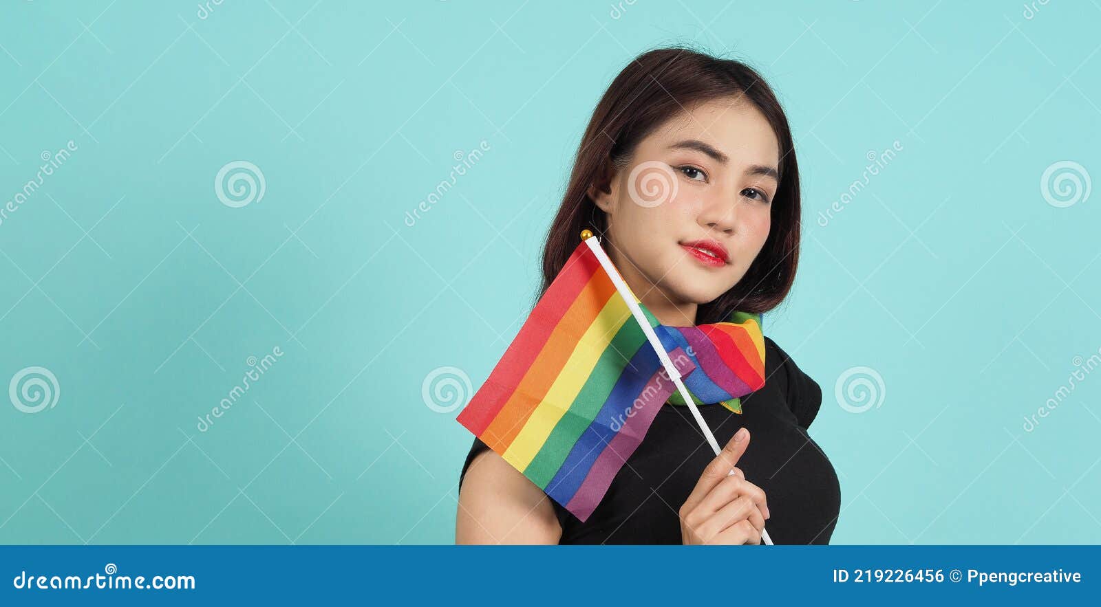 LGBTQ Girl and Pride Flag. Lesbian Girl and LGBT Flag Standing. Blue