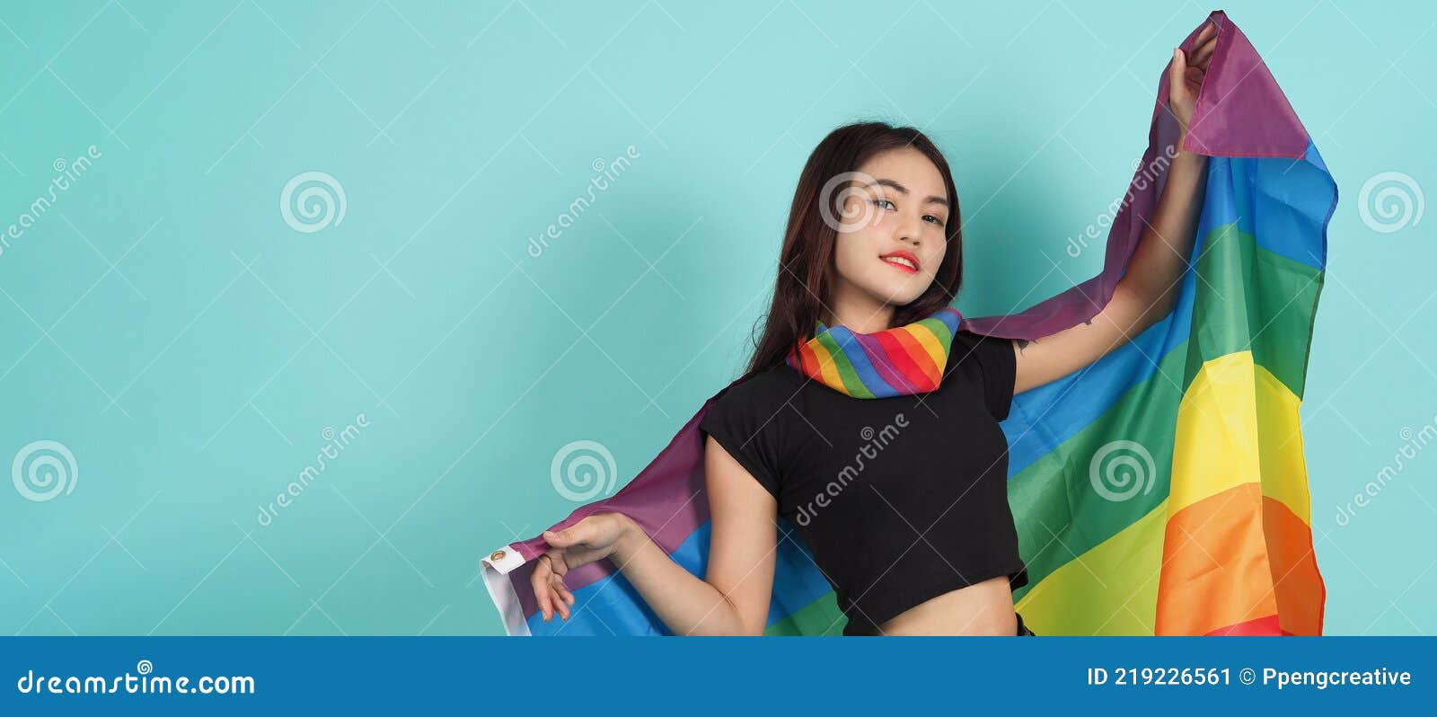 LGBTQ Girl and Pride Flag. Lesbian Girl and LGBT Flag Standing. Blue