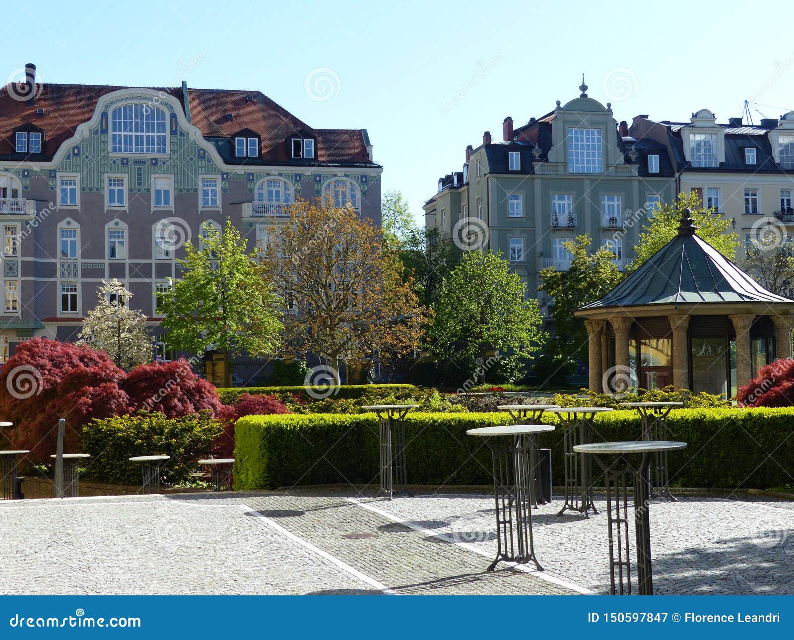 Liberty Style Building Seen From A City Garden In The Center Of