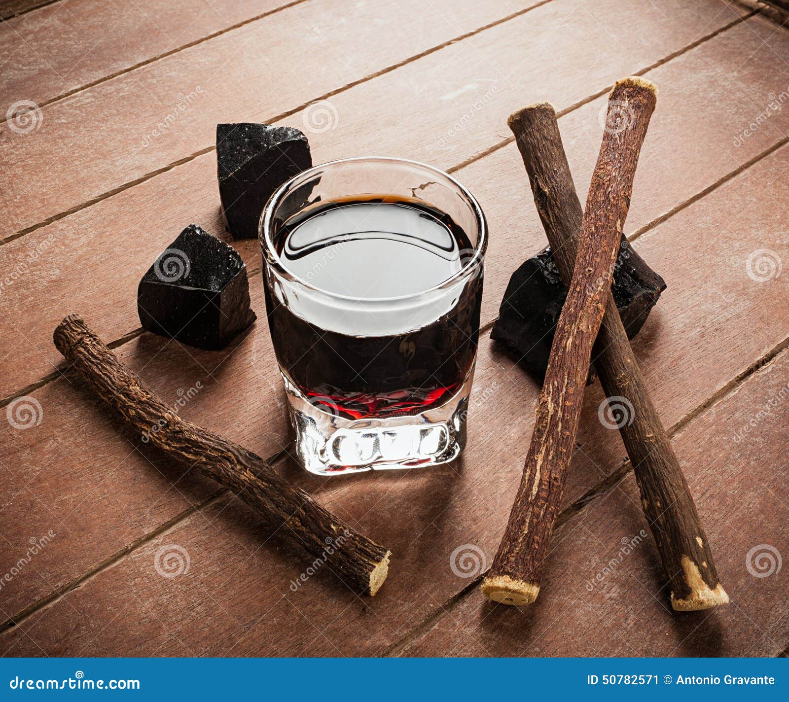 Licorice Liqueur with Pure Blocks and Roots. Stock Image Image of