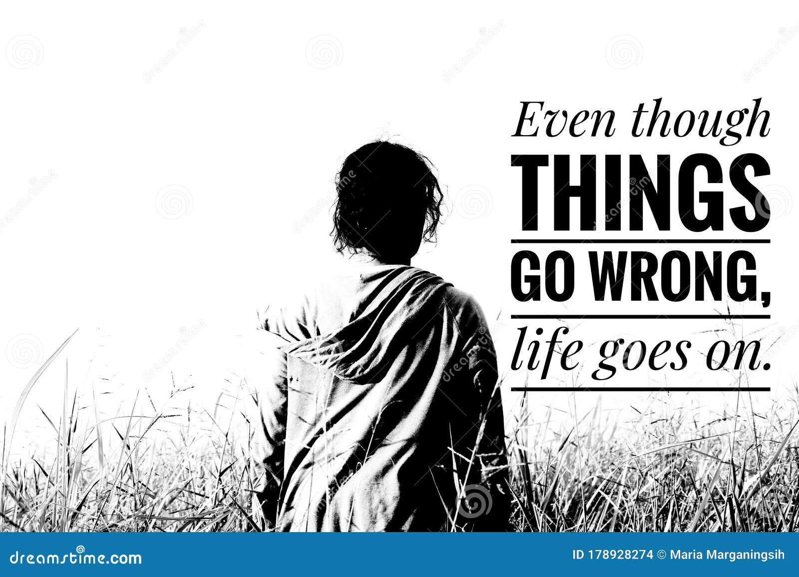 life inspirational quote - even though things go wrong, life goes on. with woman in a meadow in black and white.