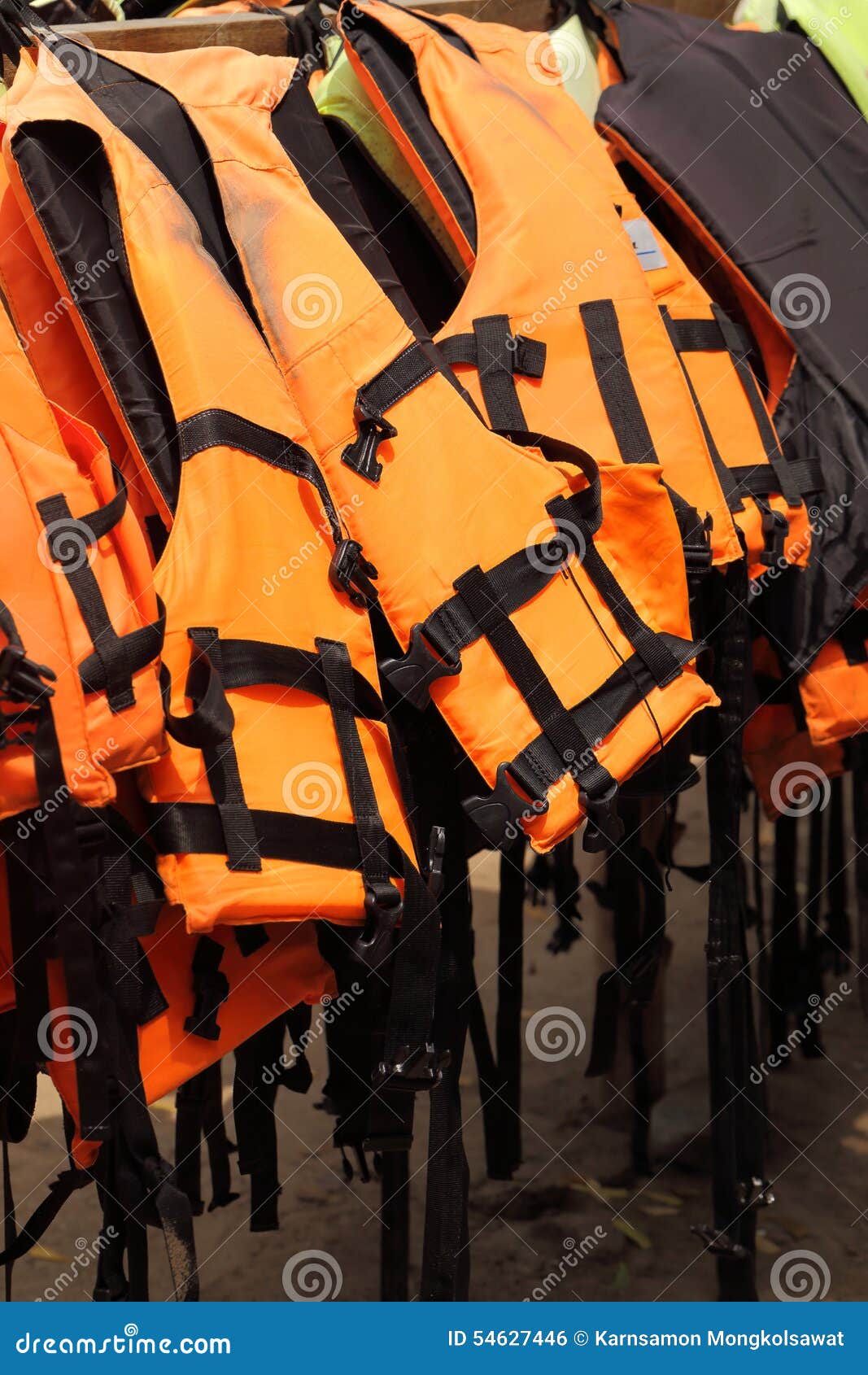 Life Jackets Hanging on the Row. Stock Photo Image of safety