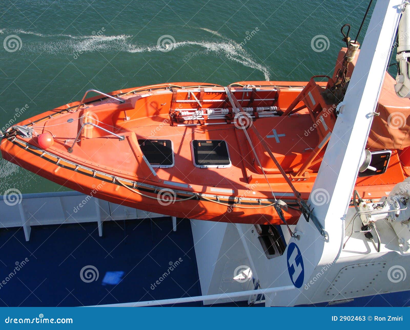 Lifeboat in bright orange stock image. Image of lifeboat 2902463