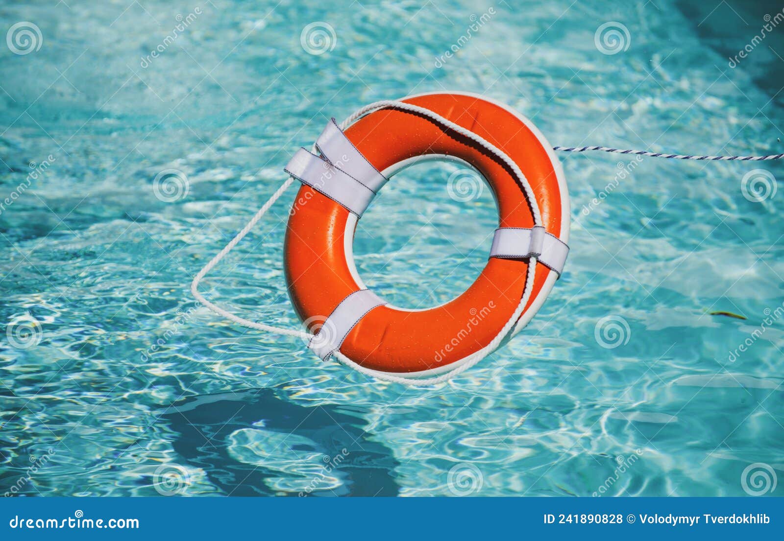 Lifebuoy Pool Ring Float on Blue Water. Stock Photo Image of beach