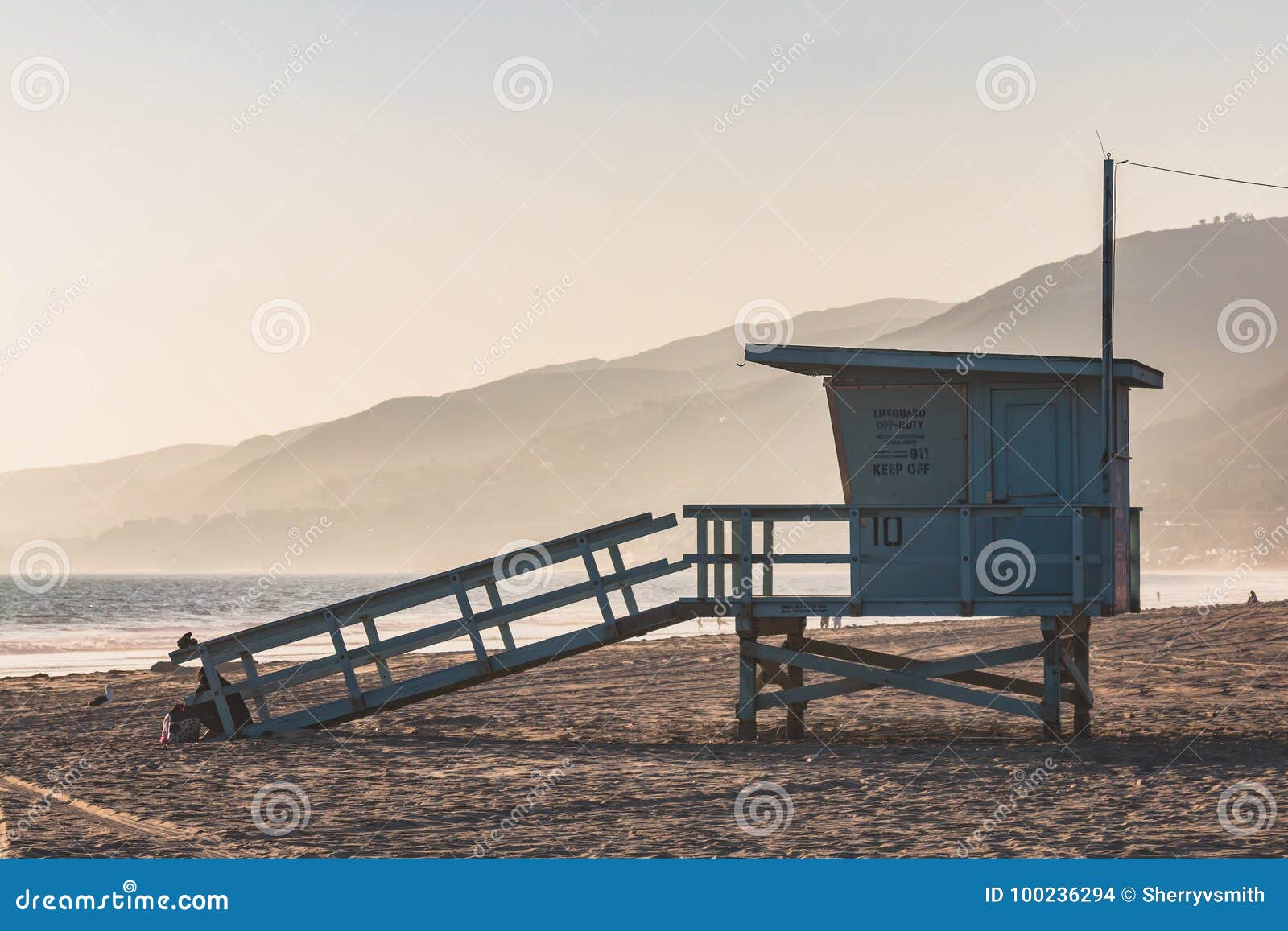 ZUMA BEACH, CALIFORNIA, USA - Lifeguard watching swimmers on Zuma