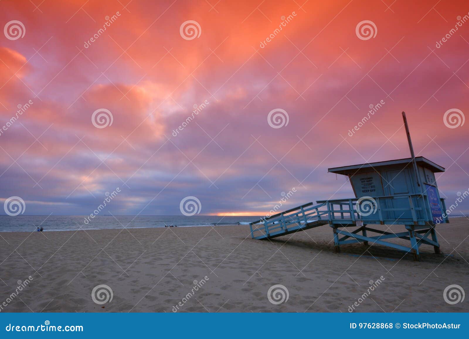 lifeguard tower at sunset at hermosa beach, california