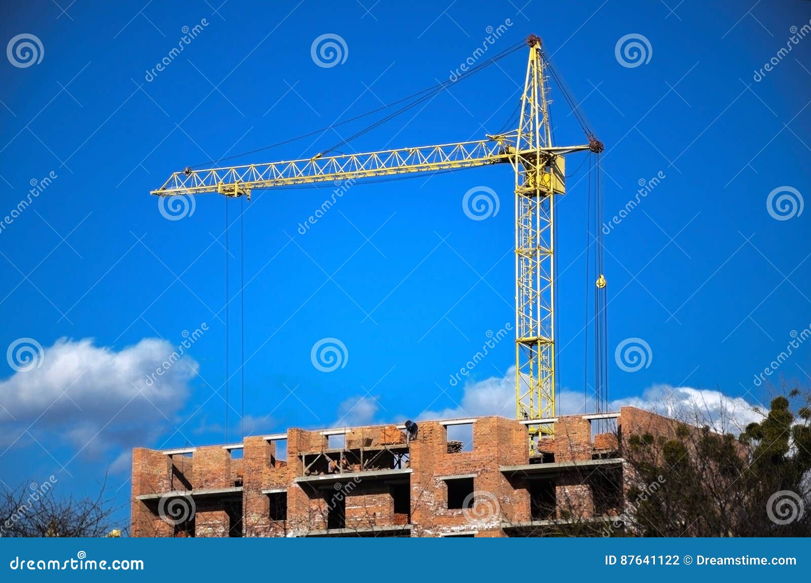 Lifting crane stock photo. Image of building, high, brick 87641122
