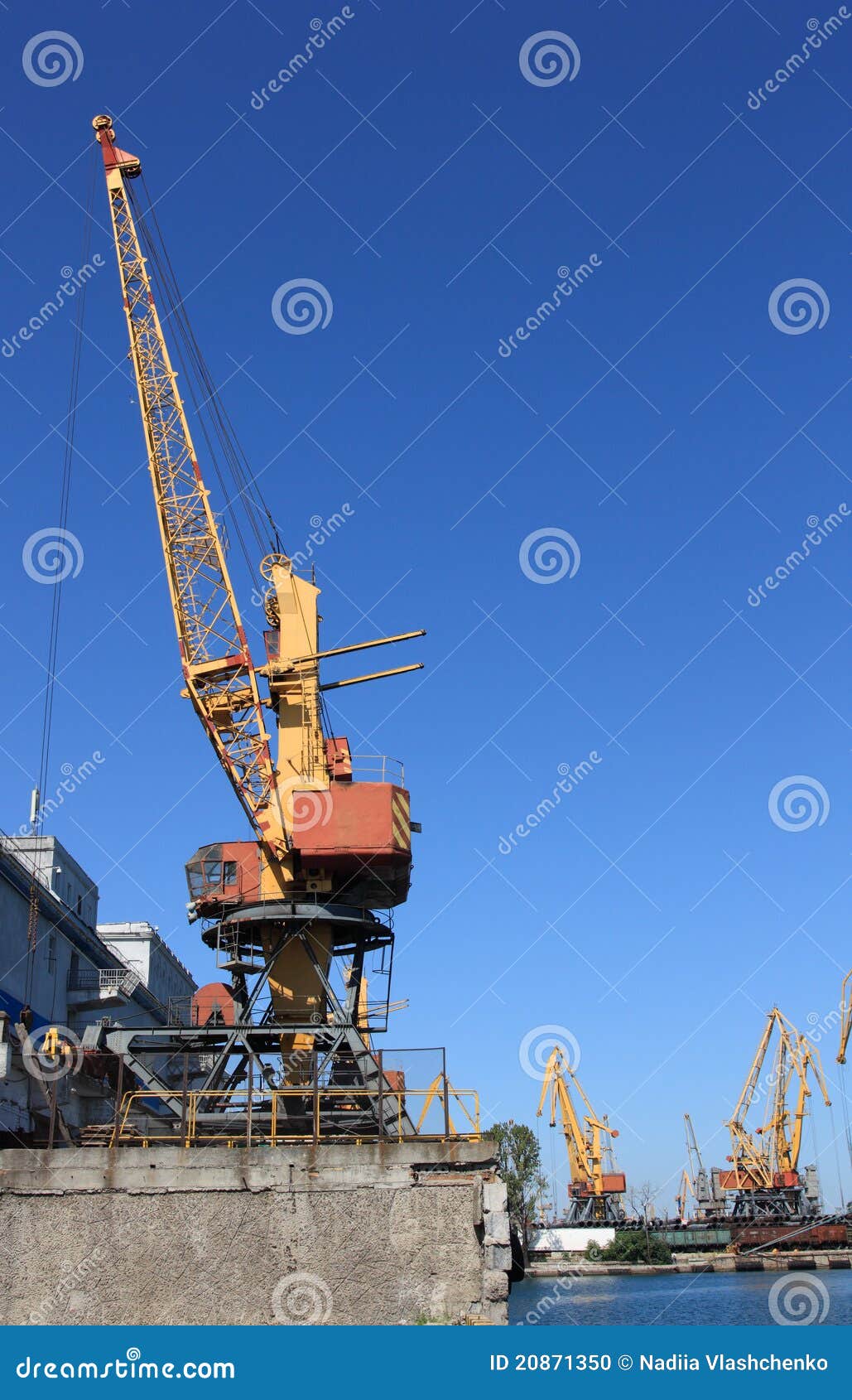 Lifting cranes in port stock photo. Image of industry 20871350
