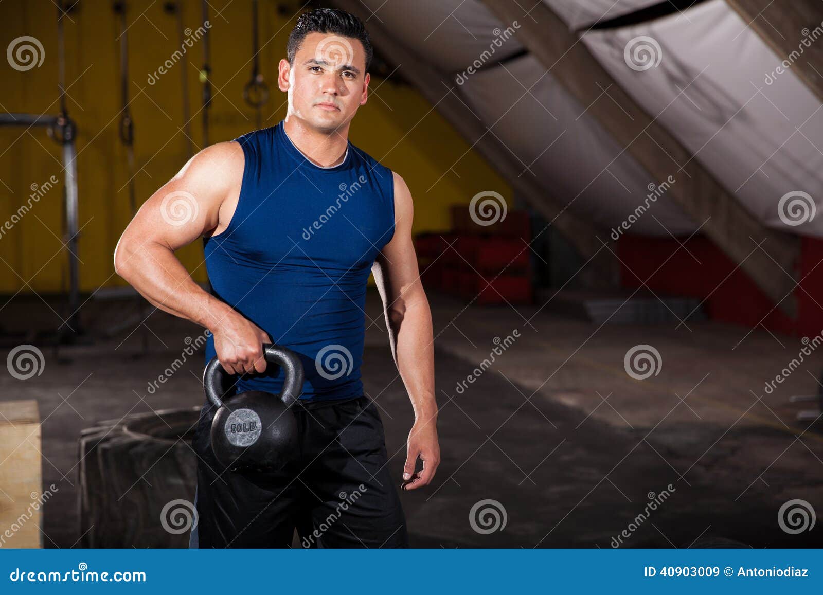 Lifting Kettlebell in a Gym Stock Image Image of equipment, latin