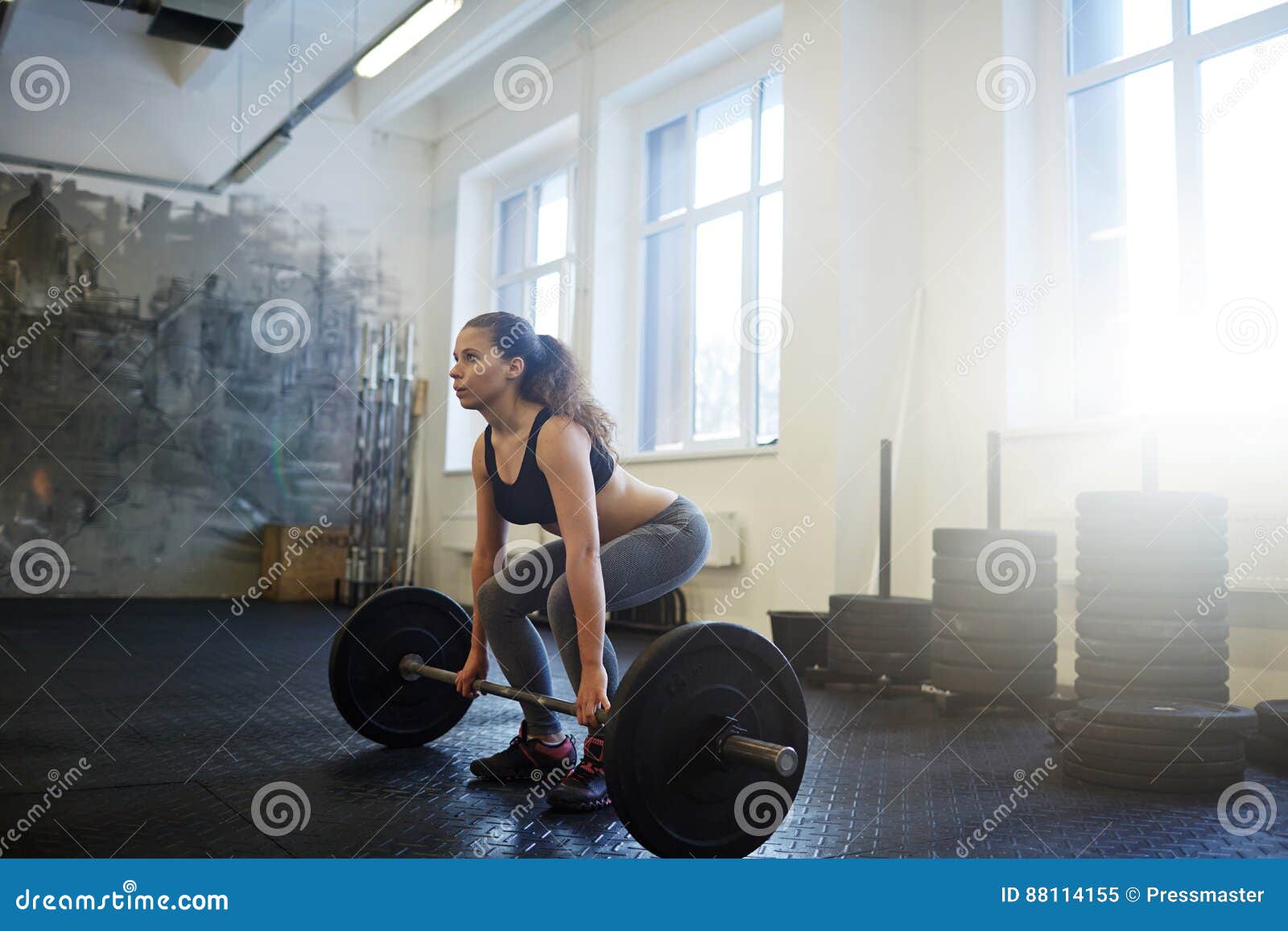 Lifting weight in gym stock image. Image of active, strong - 88114155