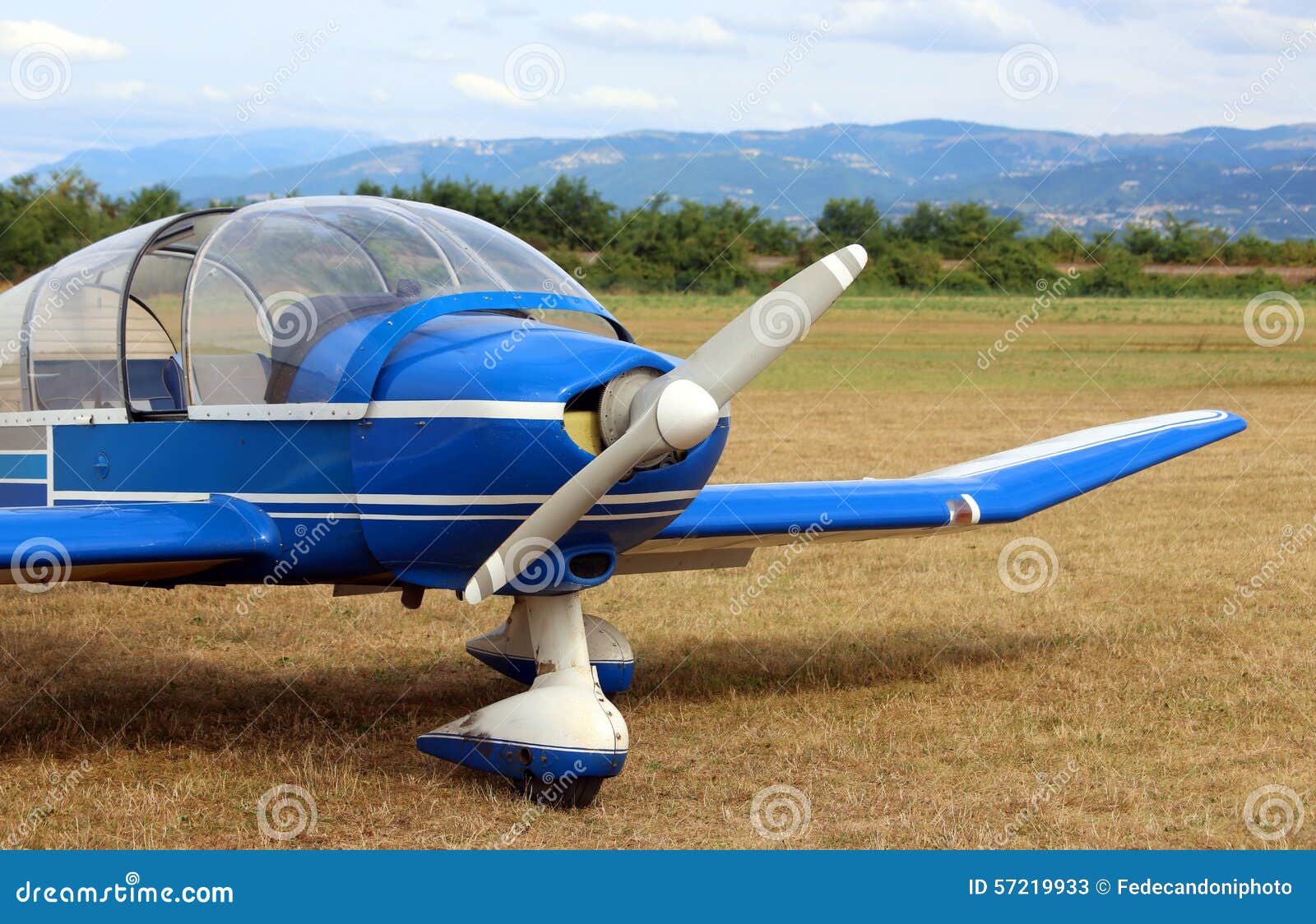 Light Aircraft at the Airport with a Propeller Ready for Takeoff Stock