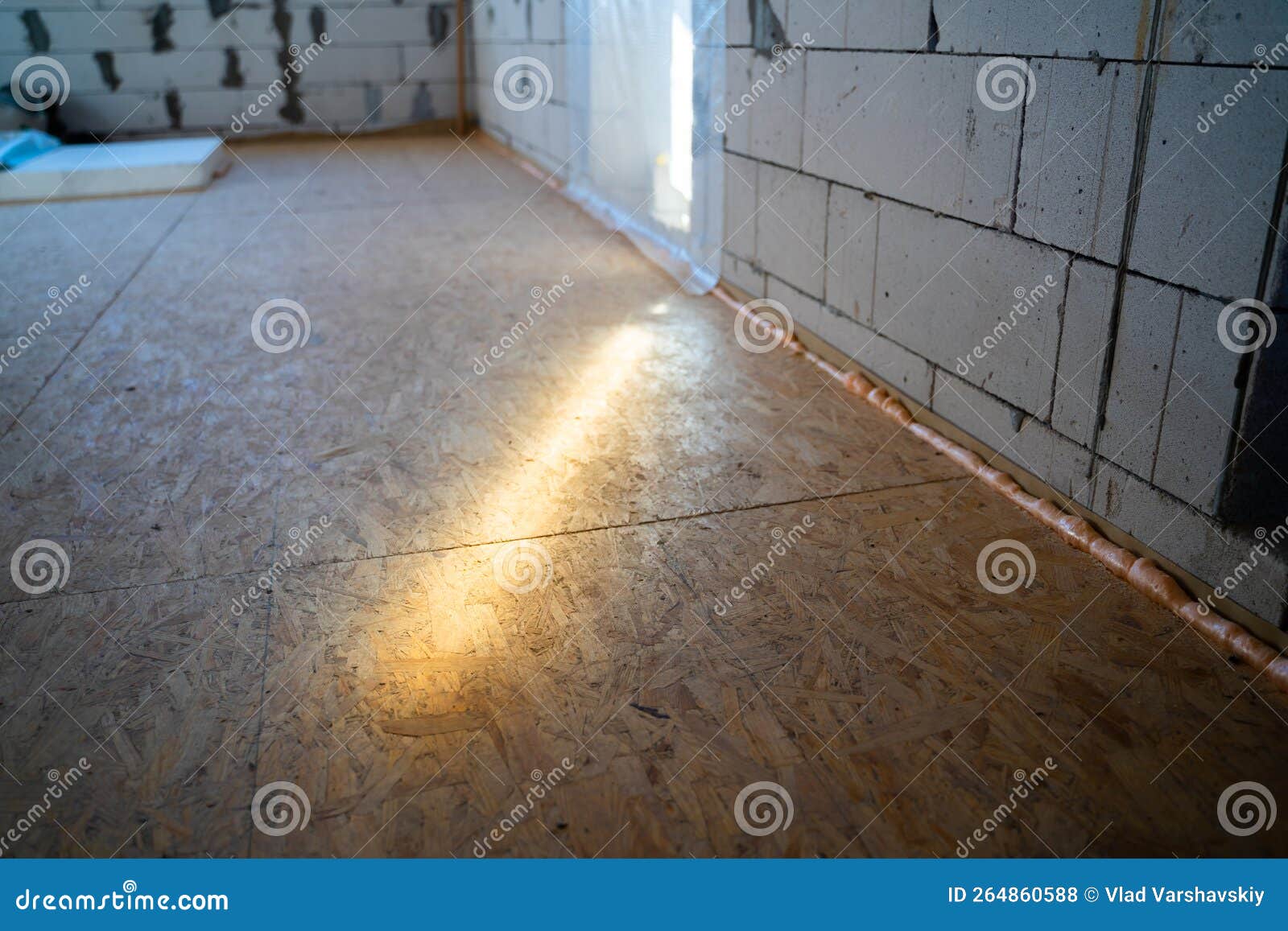 Light Beam on an Oriented Strand Board Subfloor. the First Leveling