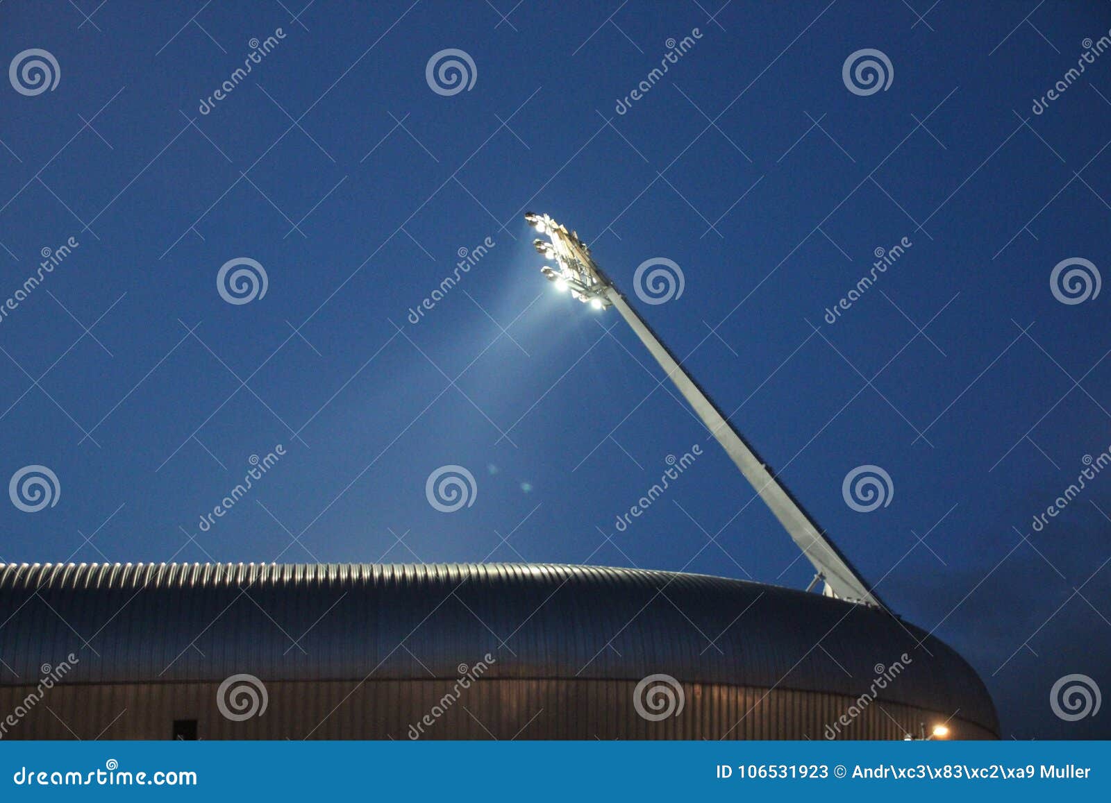 light beams from stadium light in the ado soccer stadium in the