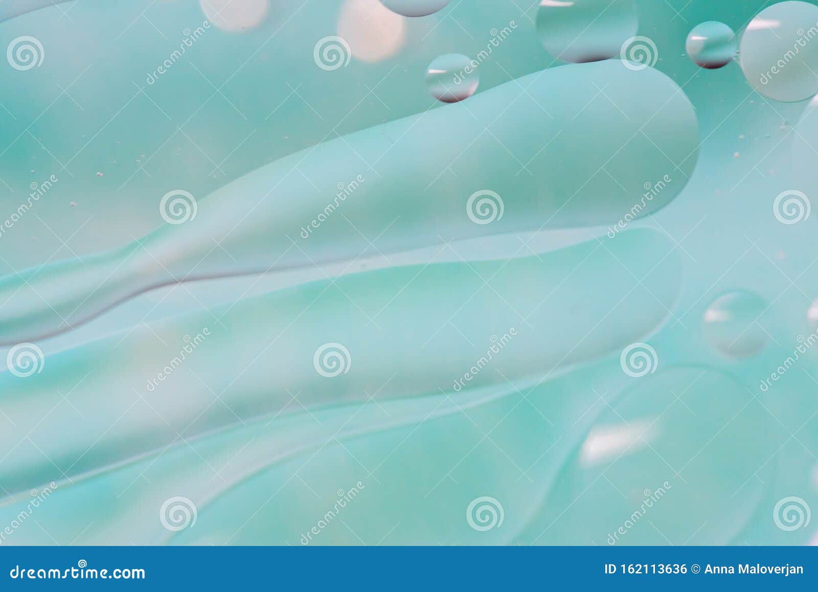 light blue abstract background picture made with oil, water and soap
