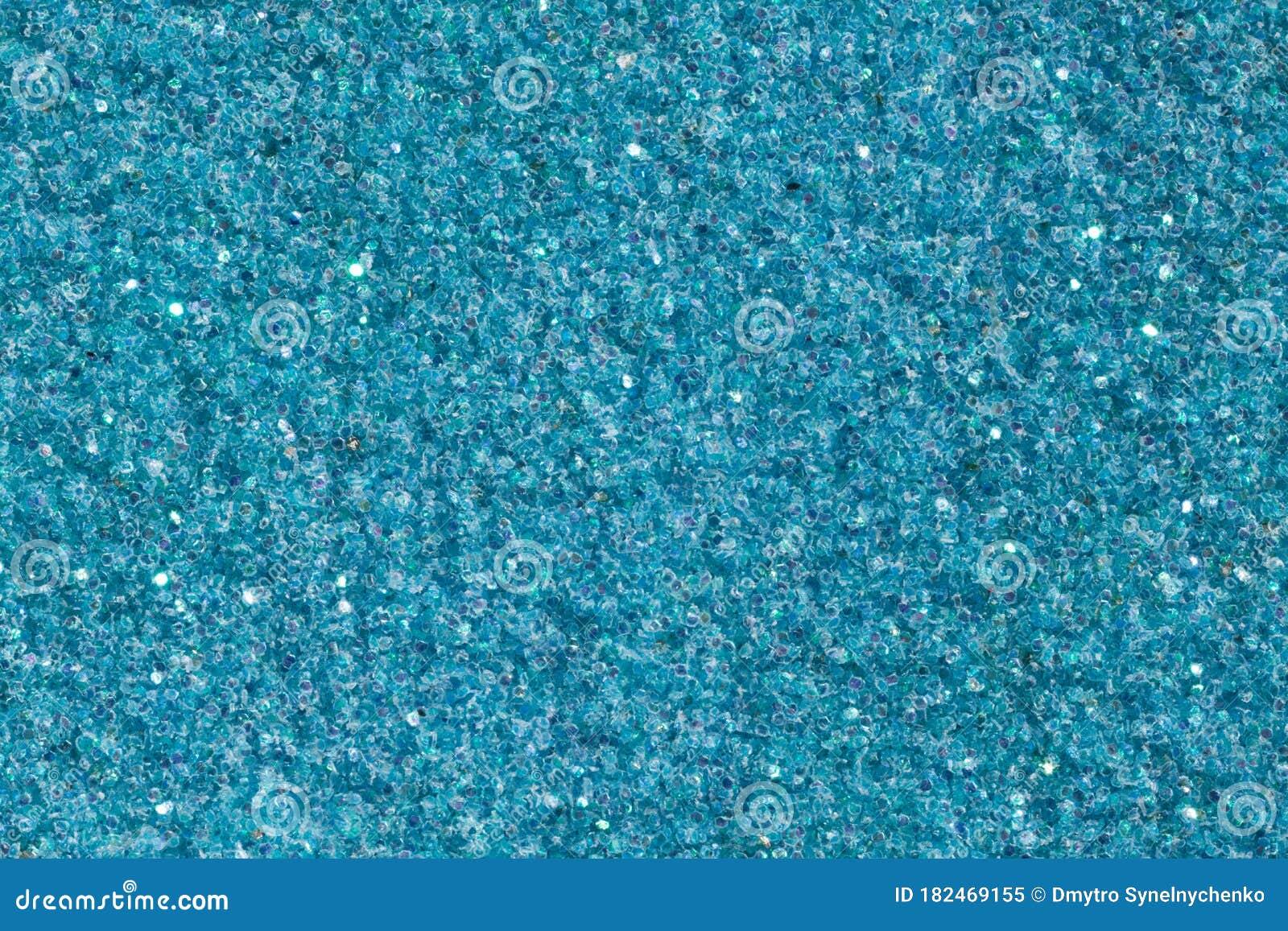 Light Blue Background with Glitter Close-up. Bright Glitter Texture