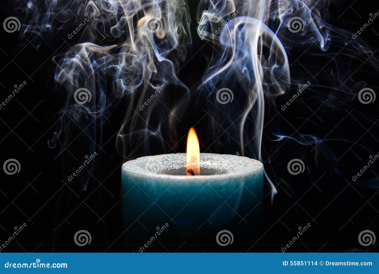 Light Blue burning candle stock photo. Image of home 55851114