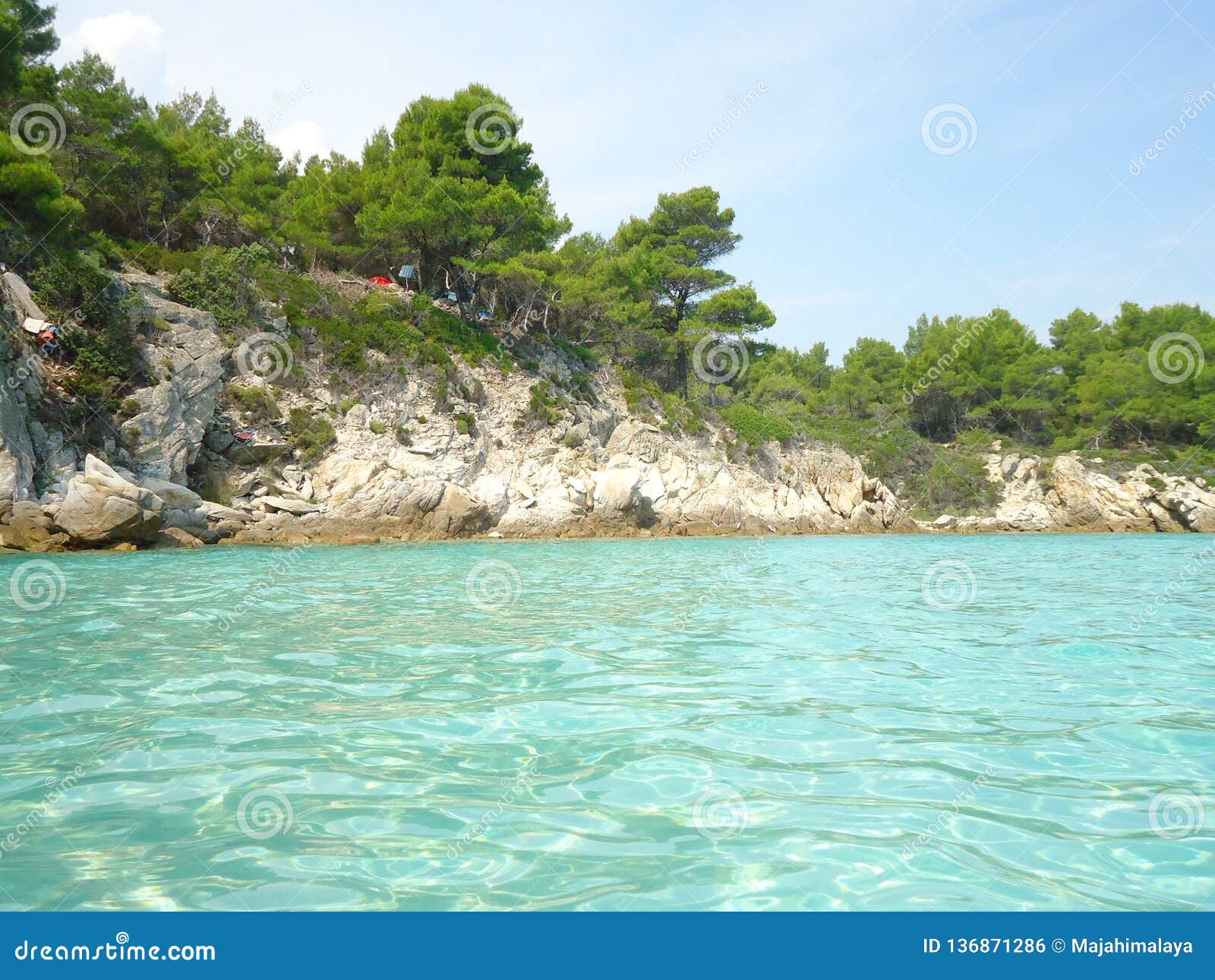 light blue sea with sea shore in greece