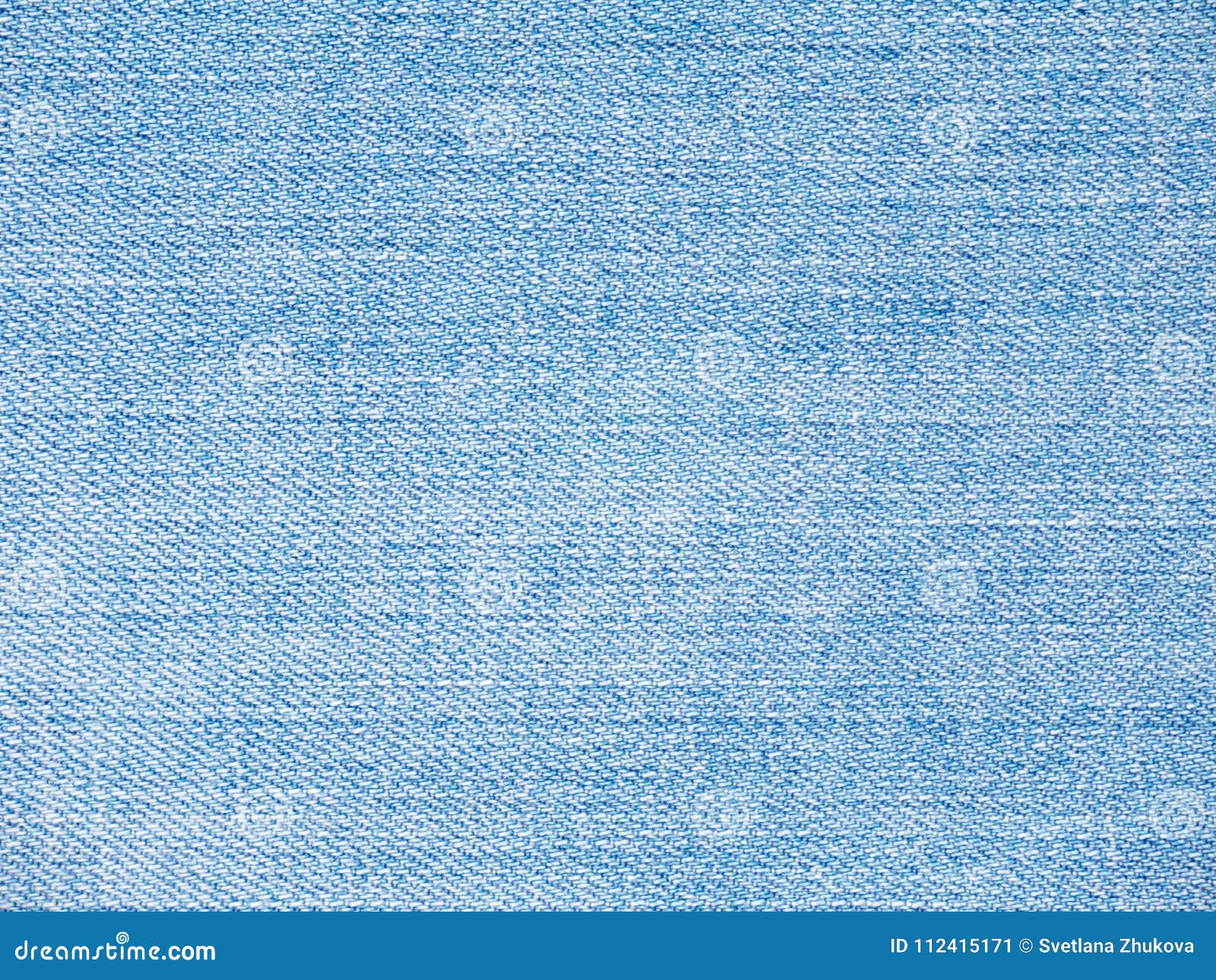 Light blue washed faded denim fabric texture swatch Stock Photo - 97992476