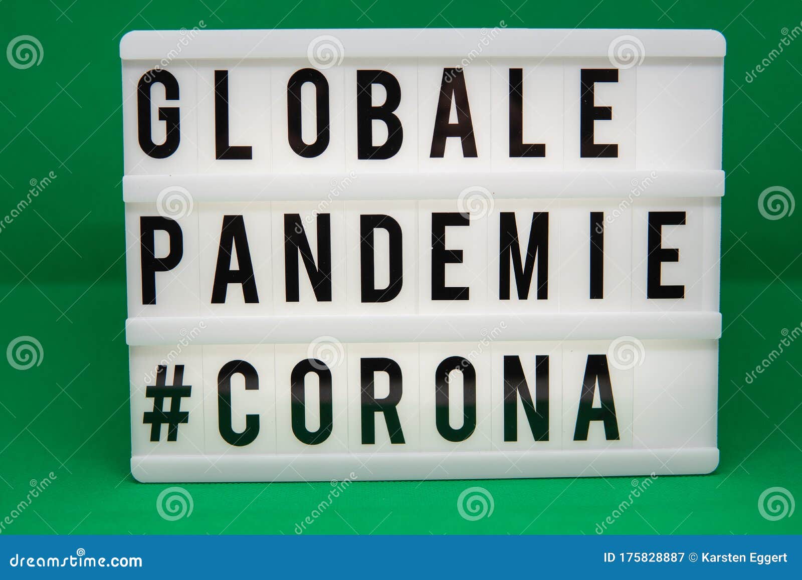 a light box with the inscription: globale pandemie #corona with white background
