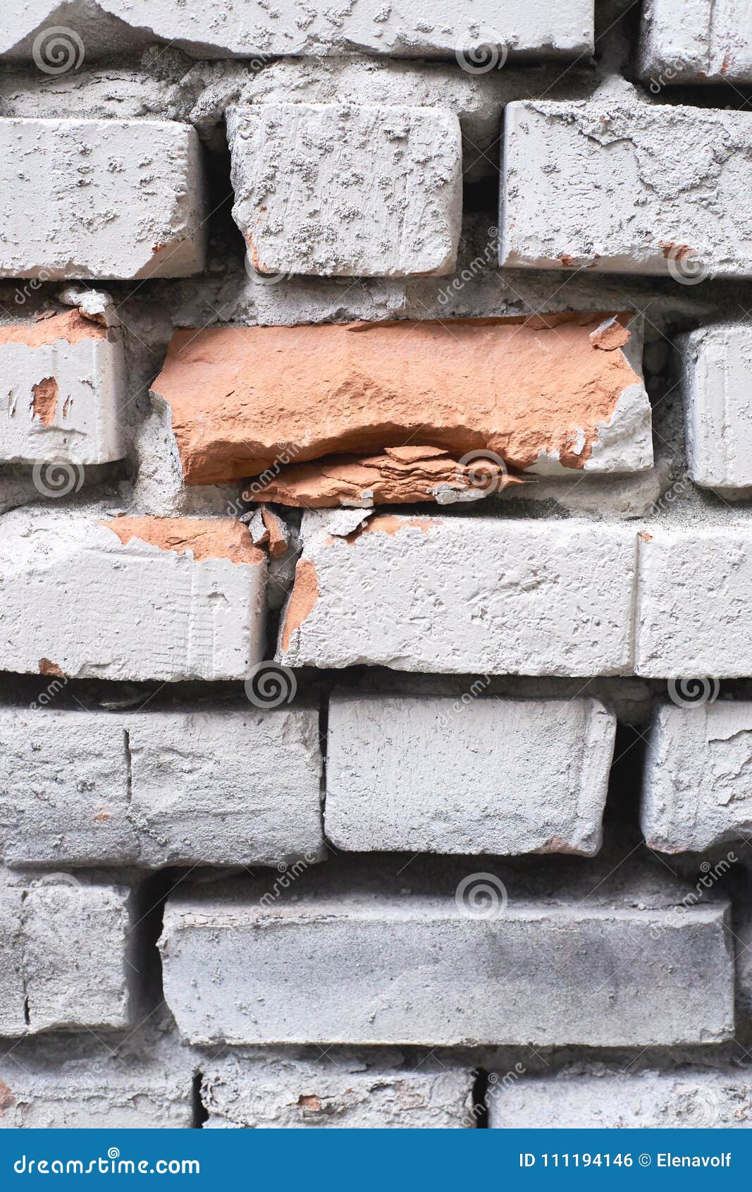 light brick wall. old architecture. large slits