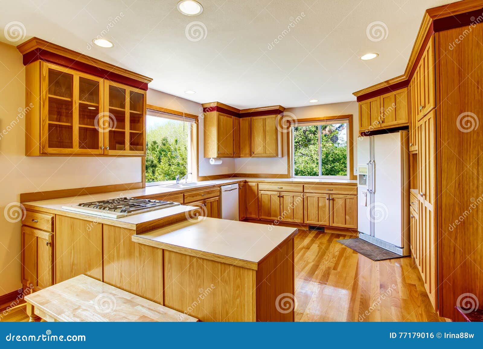 Light Brown Kitchen Cabinets White Appliances And Hardwood Floor