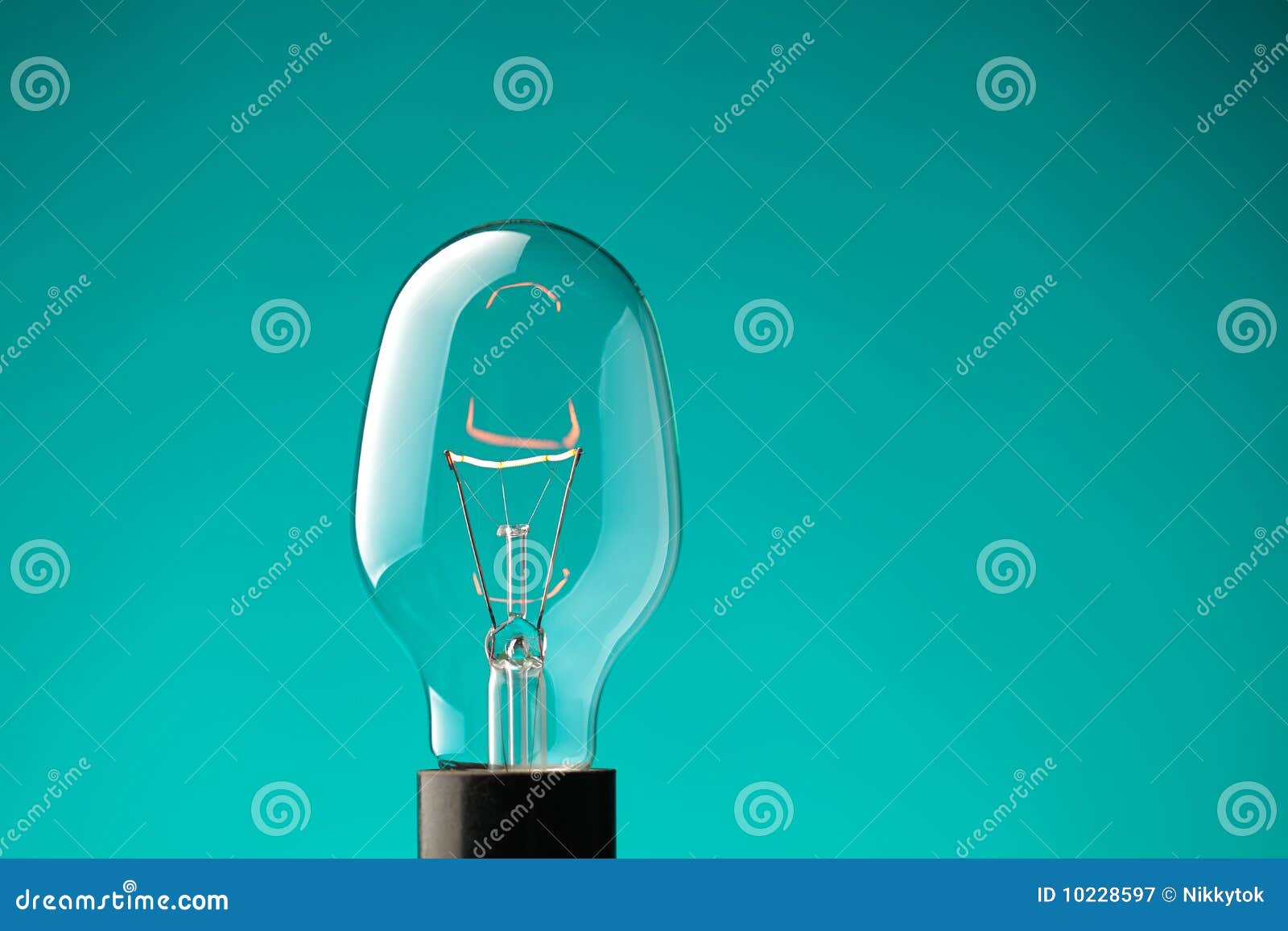 Light bulb on blue stock image. Image of bulb, glass 10228597