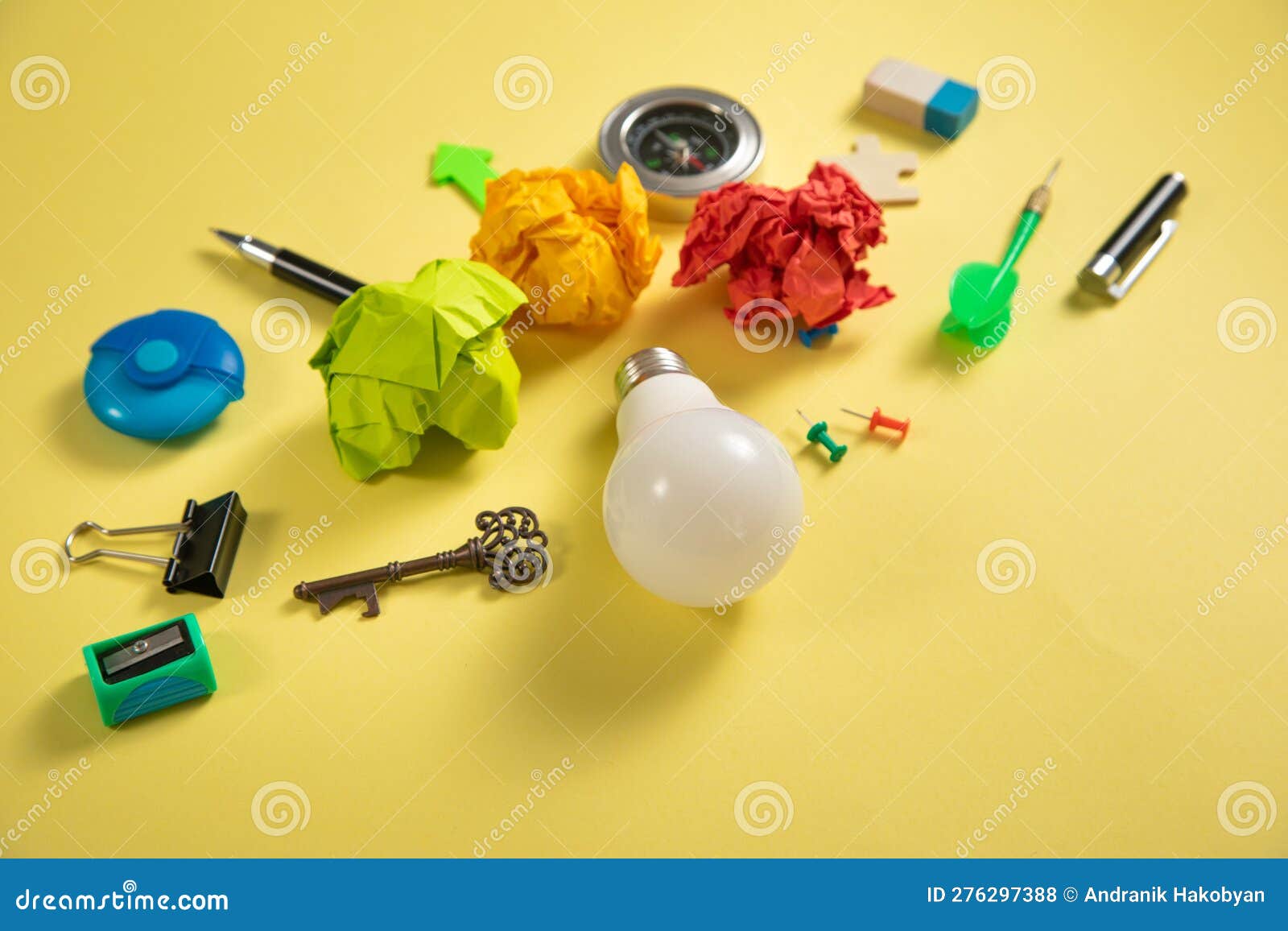 Light Bulb with a Business Supplies. Business Stock Photo Image of