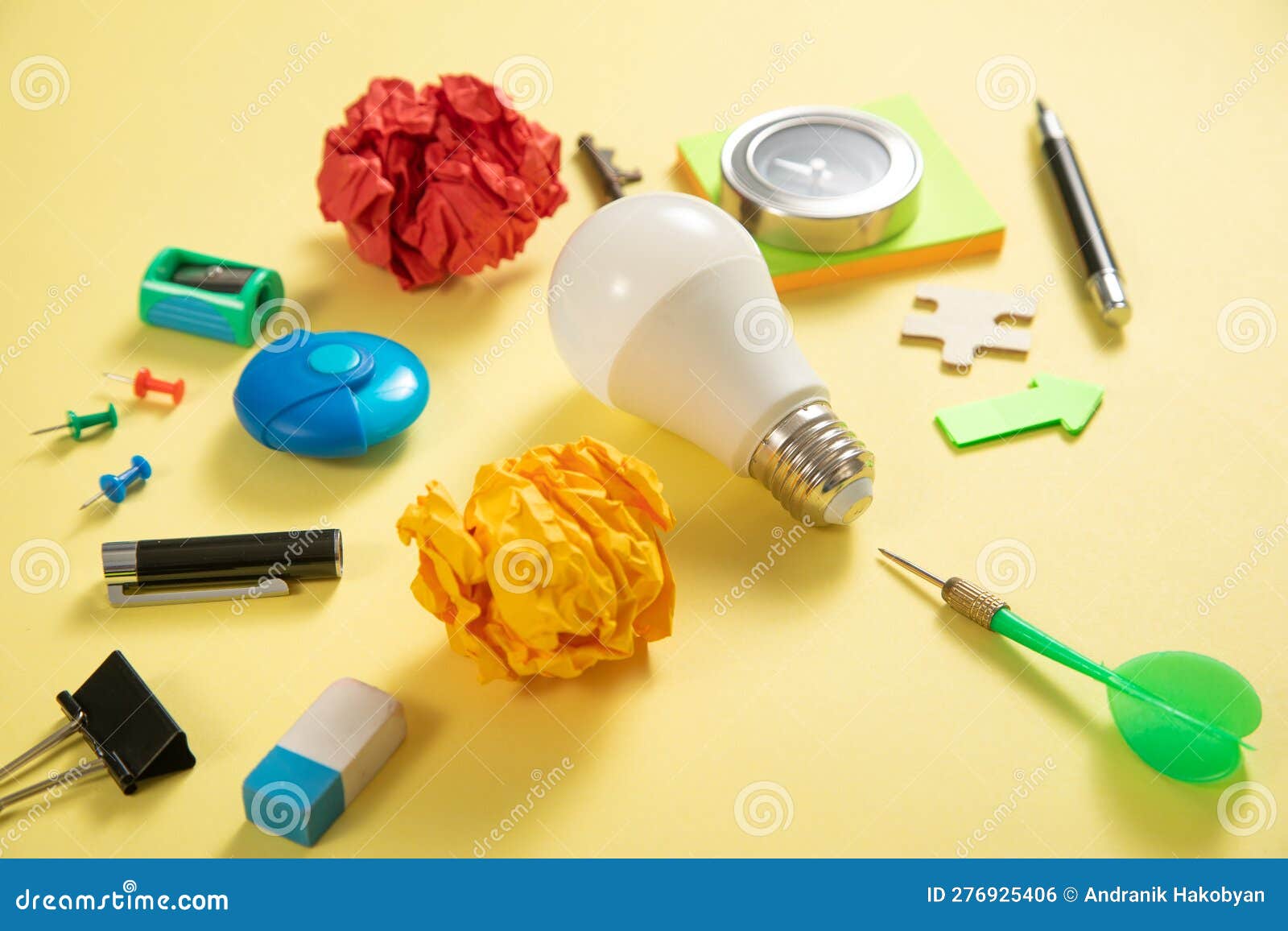 Light Bulb with a Business Supplies. Business Stock Photo Image of