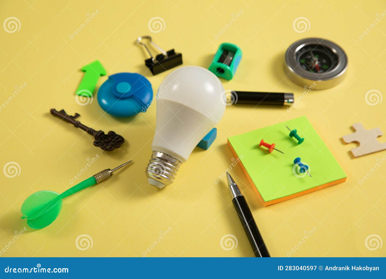 Light Bulb with a Business Supplies. Business Stock Image Image of