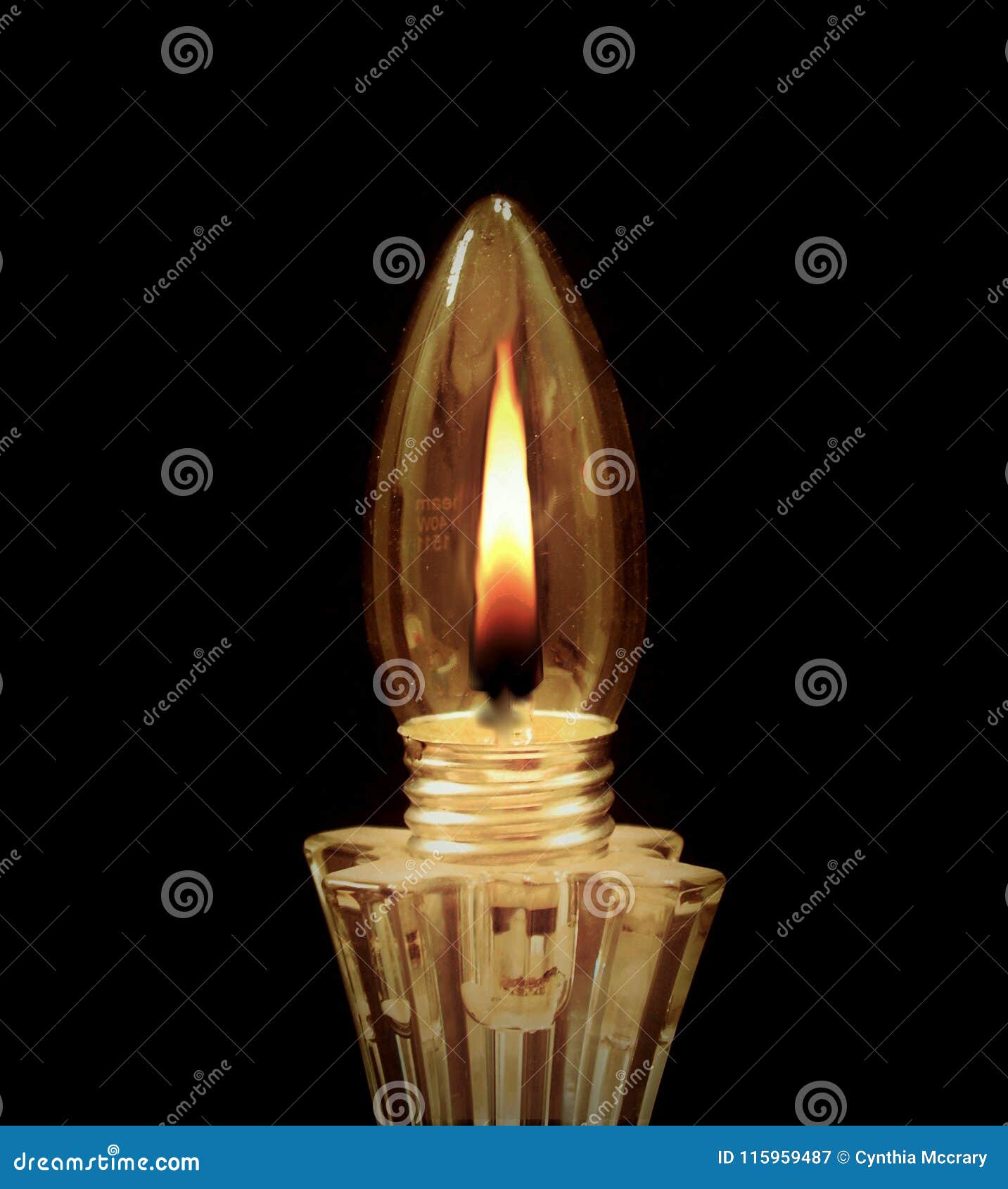 Light Bulb in Candlestick Burning Bright Stock Image Image of burn