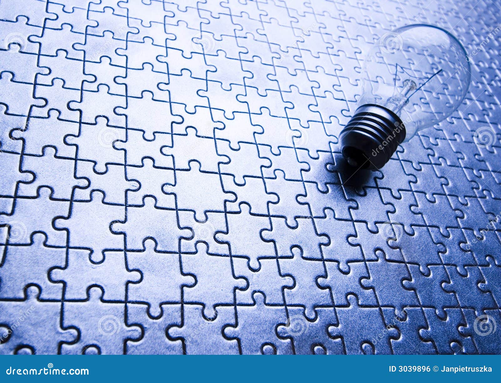 Light bulb on jigsaws stock photo. Image of jigsaw, creative 3039896