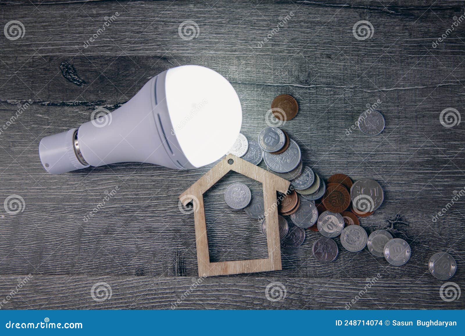 Light Bulb and Money on the Table Stock Photo Image of energy