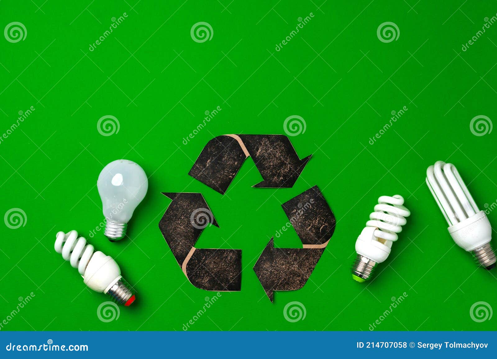 Light Bulb and Recycling Sign on Green Background Stock Photo Image